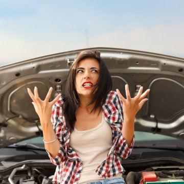 extended car warranty services providers best autopom warranty direct aa auto protection woman mad frustrated sitting on broken car car with open hood